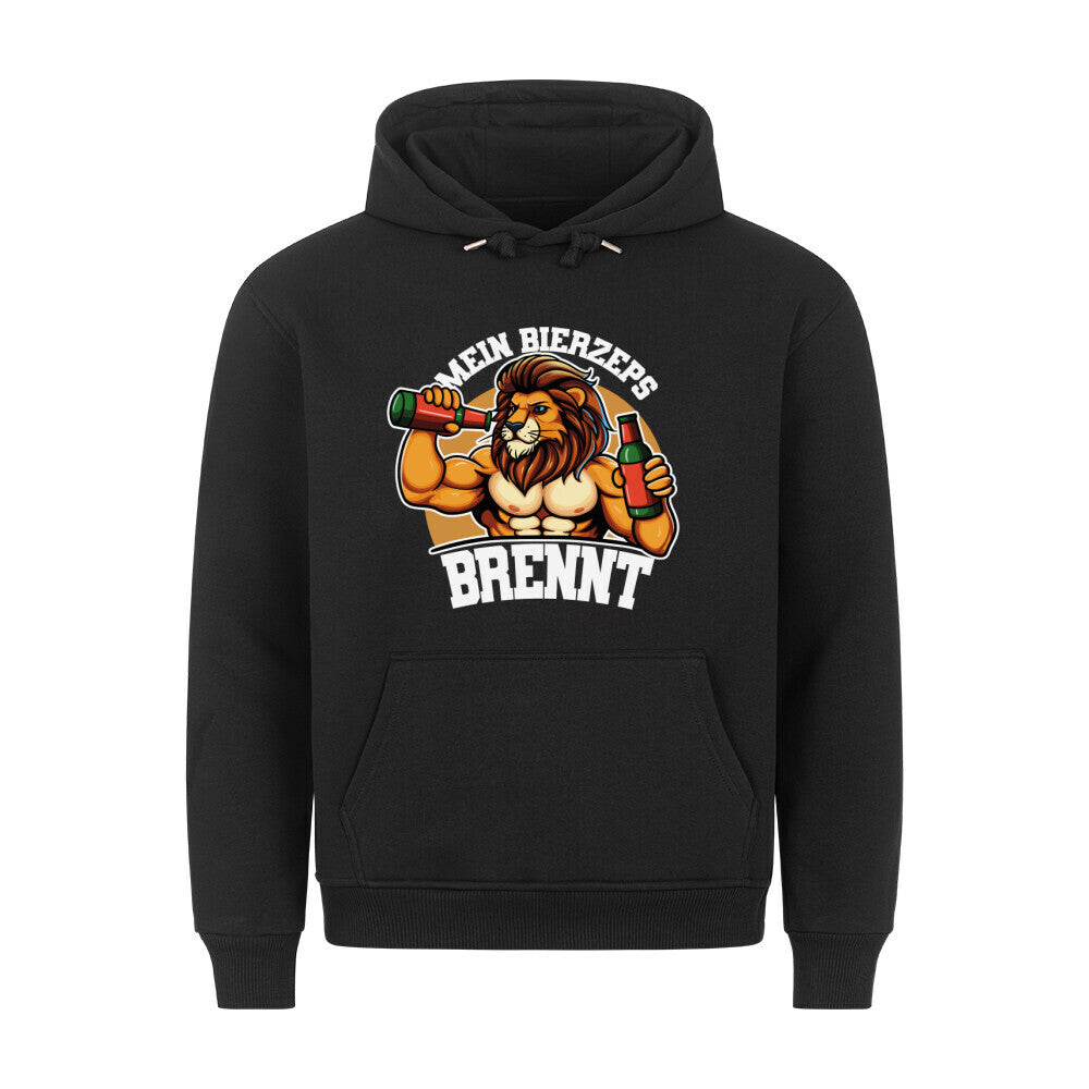 Schwarzer Hoodie. Auf der Vorderseite ist ein stilisierter, muskulöser Löwe mit Bier in den Händen abgebildet, umgeben vom Schriftzug "MEIN BIERZEPS BRENNT" in geschwungener Schrift.