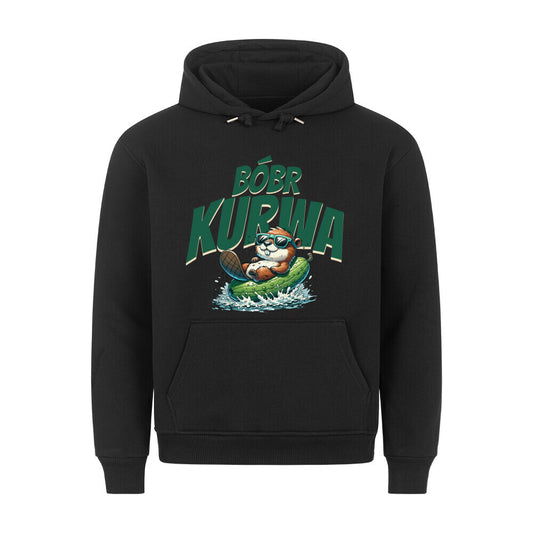 Schwarzer Hoodie. Auf der Vorderseite ist ein stilisierter, brauner Biber mit Sonnenbrille abgebildet, der auf einer gruenen Gurke reitet. Über dem Biber steht der polnische Text "BÓBR K*RWA" in gruenen Buchstaben.