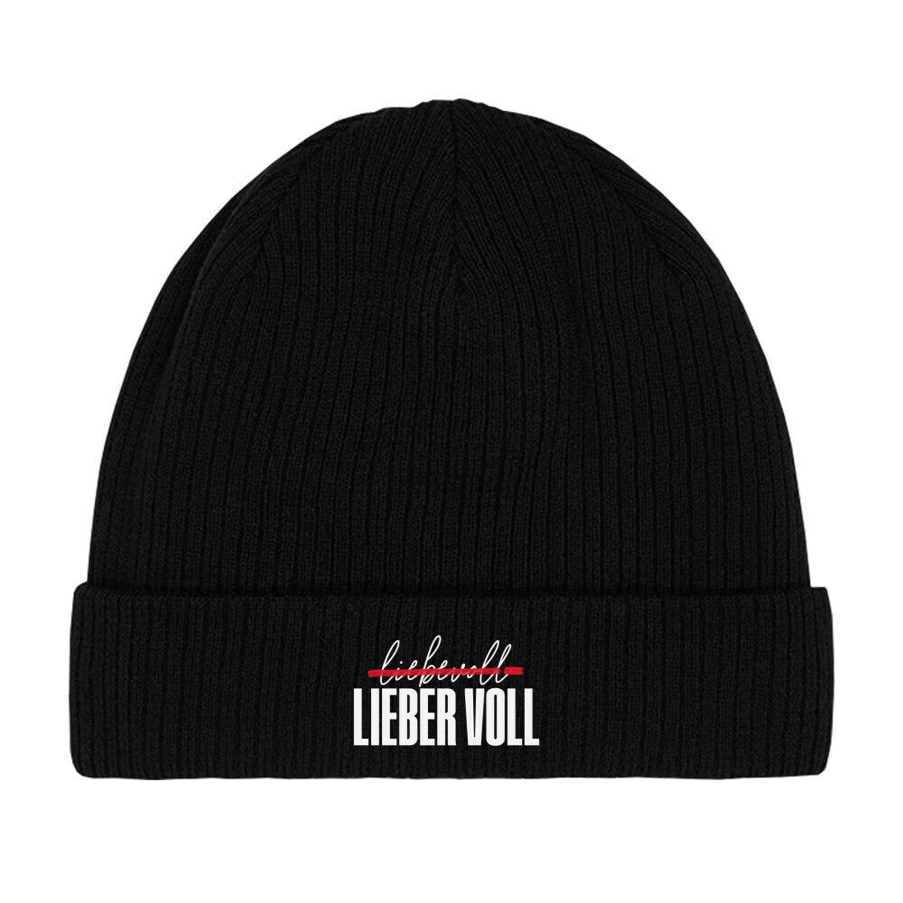 Schwarzer Beanie. Auf der Vorderseite befindet sich der Schriftzug "liebevoll LIEBER VOLL" in einer Kombination aus weißer und roter Farbe. Das Wort "liebevoll" ist dabei mit einer Linie durchgestrichen.